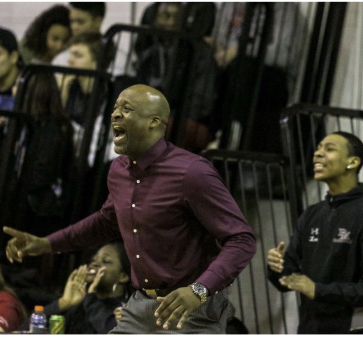 Coach Leo directing his team during a game