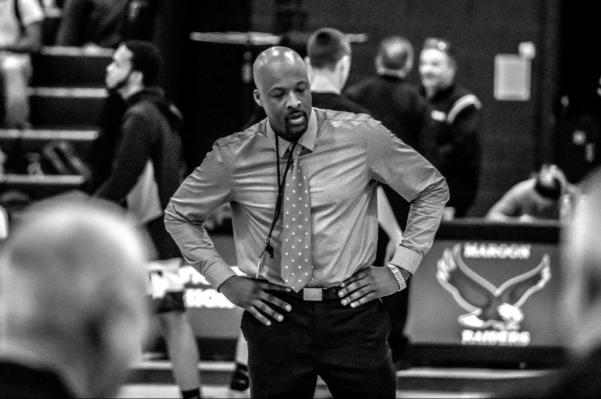 Coach Leo Jones coaching courtside